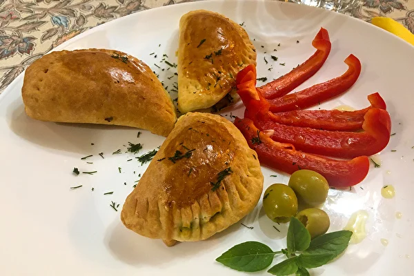 Gebackene Pierogi mit Spinat